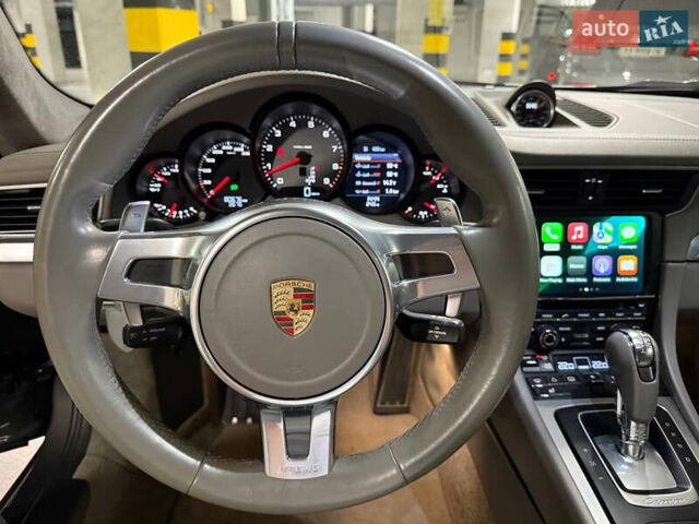 Серый Порше 911, объемом двигателя 3.8 л и пробегом 80 тыс. км за 71000 $, фото 7 на Automoto.ua