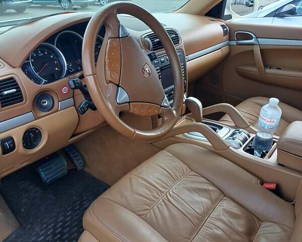 Белый Порше Каен, объемом двигателя 4.8 л и пробегом 178 тыс. км за 8500 $, фото 3 на Automoto.ua