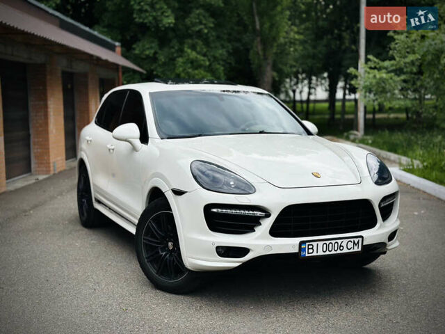 Белый Порше Каен, объемом двигателя 3.6 л и пробегом 255 тыс. км за 17500 $, фото 1 на Automoto.ua