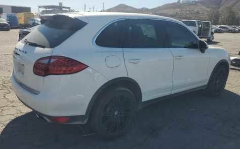 Белый Порше Каен, объемом двигателя 4.8 л и пробегом 195 тыс. км за 6855 $, фото 2 на Automoto.ua