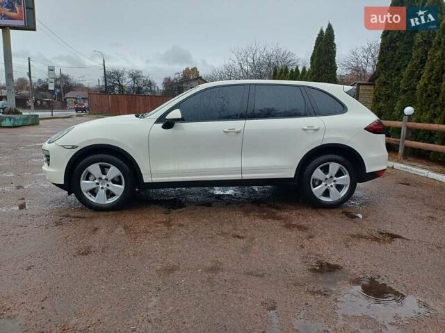 Белый Порше Каен, объемом двигателя 4.81 л и пробегом 168 тыс. км за 14000 $, фото 5 на Automoto.ua