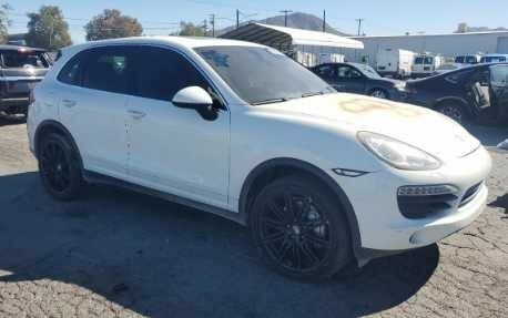 Белый Порше Каен, объемом двигателя 4.8 л и пробегом 195 тыс. км за 6855 $, фото 3 на Automoto.ua