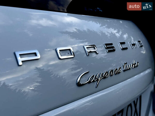 Белый Порше Каен, объемом двигателя 4.81 л и пробегом 133 тыс. км за 22000 $, фото 1 на Automoto.ua