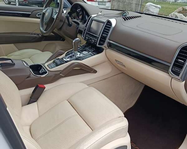 Белый Порше Каен, объемом двигателя 3.6 л и пробегом 193 тыс. км за 24500 $, фото 21 на Automoto.ua