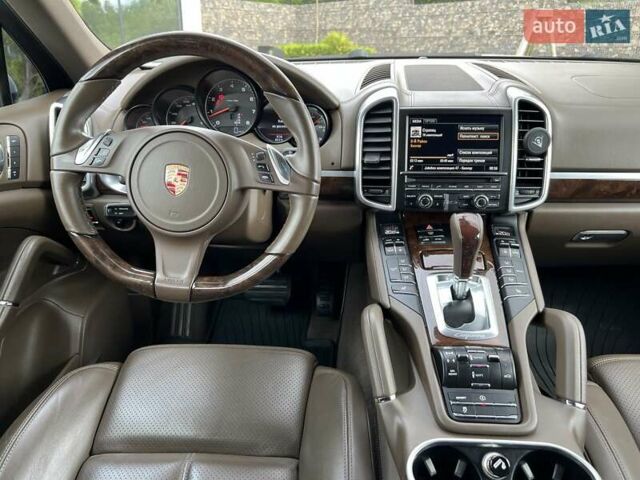 Белый Порше Каен, объемом двигателя 3.6 л и пробегом 83 тыс. км за 27000 $, фото 1 на Automoto.ua