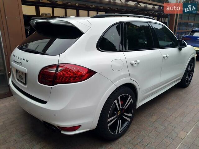 Белый Порше Каен, объемом двигателя 4.81 л и пробегом 62 тыс. км за 34500 $, фото 5 на Automoto.ua