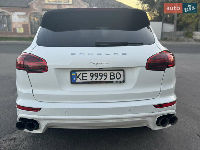 Белый Порше Каен, объемом двигателя 2.97 л и пробегом 145 тыс. км за 34567 $, фото 2 на Automoto.ua