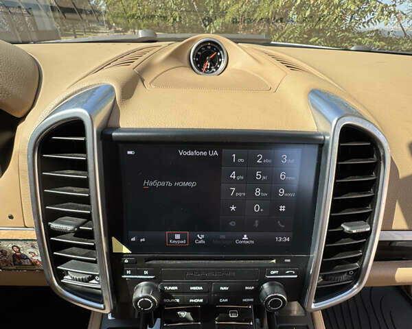 Белый Порше Каен, объемом двигателя 3.6 л и пробегом 115 тыс. км за 27000 $, фото 9 на Automoto.ua