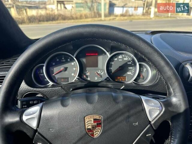 Черный Порше Каен, объемом двигателя 4.5 л и пробегом 348 тыс. км за 8300 $, фото 1 на Automoto.ua