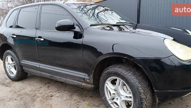 Черный Порше Каен, объемом двигателя 4.5 л и пробегом 240 тыс. км за 6700 $, фото 1 на Automoto.ua