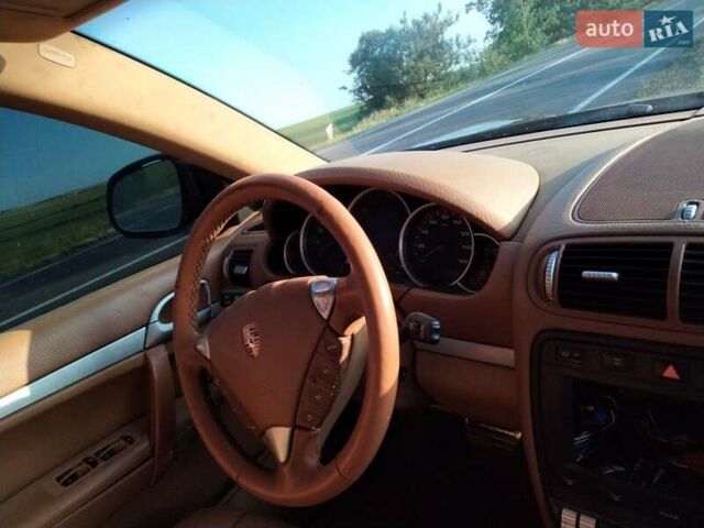 Черный Порше Каен, объемом двигателя 4.5 л и пробегом 200 тыс. км за 2500 $, фото 3 на Automoto.ua