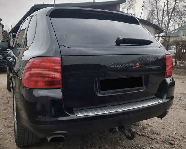 Черный Порше Каен, объемом двигателя 4.5 л и пробегом 206 тыс. км за 8500 $, фото 5 на Automoto.ua