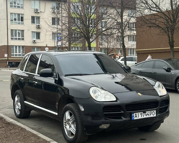 Черный Порше Каен, объемом двигателя 4.51 л и пробегом 157 тыс. км за 7000 $, фото 1 на Automoto.ua