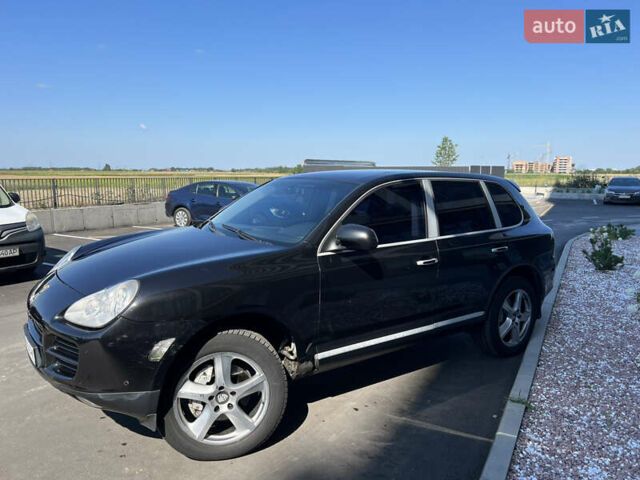 Черный Порше Каен, объемом двигателя 4.5 л и пробегом 378 тыс. км за 6600 $, фото 6 на Automoto.ua