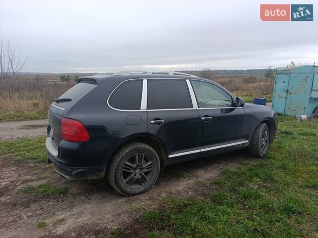 Чорний Порше Cayenne, об'ємом двигуна 4.51 л та пробігом 273 тис. км за 10500 $, фото 1 на Automoto.ua