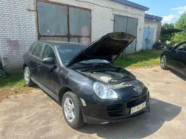 Черный Порше Каен, объемом двигателя 3.2 л и пробегом 200 тыс. км за 2500 $, фото 1 на Automoto.ua