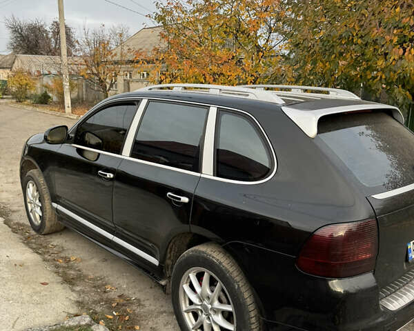 Черный Порше Каен, объемом двигателя 4.5 л и пробегом 258 тыс. км за 7499 $, фото 6 на Automoto.ua