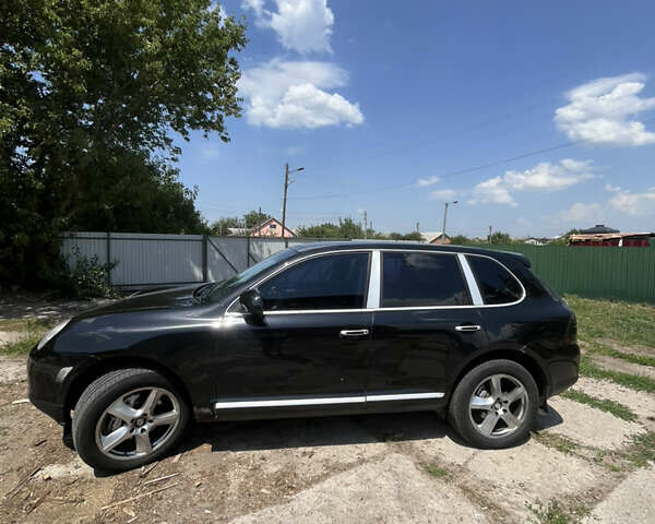 Черный Порше Каен, объемом двигателя 4.51 л и пробегом 376 тыс. км за 5600 $, фото 2 на Automoto.ua