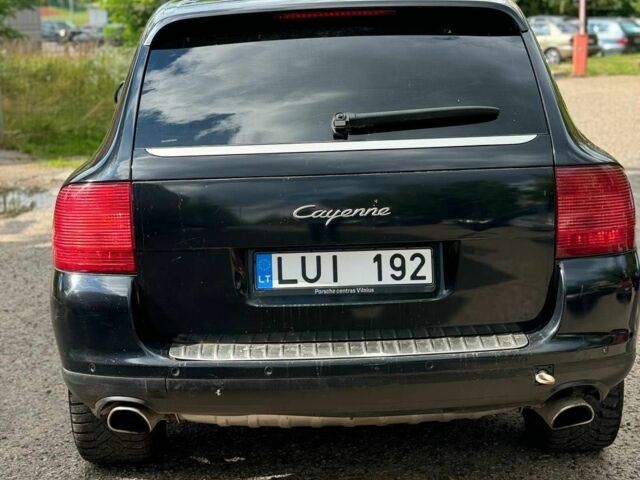 Черный Порше Каен, объемом двигателя 3.2 л и пробегом 200 тыс. км за 4500 $, фото 6 на Automoto.ua