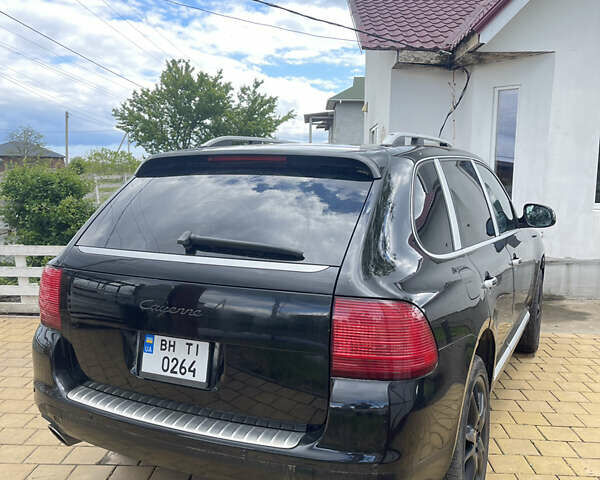 Черный Порше Каен, объемом двигателя 3.2 л и пробегом 300 тыс. км за 7800 $, фото 3 на Automoto.ua