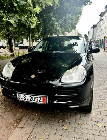 Черный Порше Каен, объемом двигателя 4.5 л и пробегом 297 тыс. км за 8500 $, фото 1 на Automoto.ua