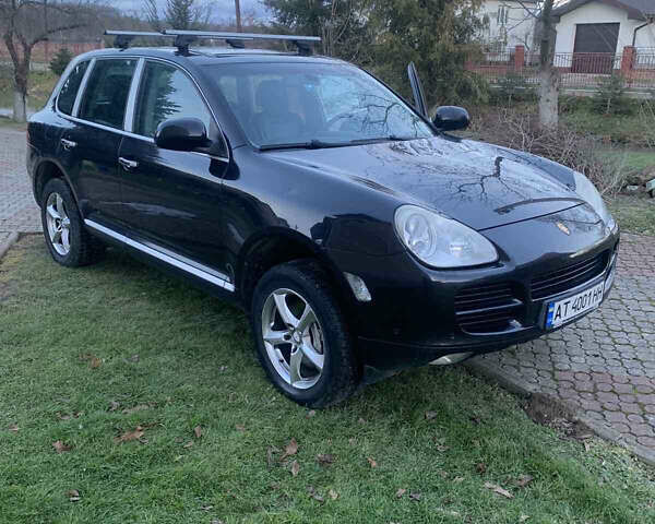 Чорний Порше Cayenne, об'ємом двигуна 4.51 л та пробігом 337 тис. км за 8500 $, фото 4 на Automoto.ua