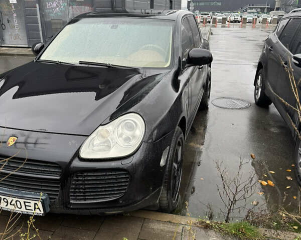 Черный Порше Каен, объемом двигателя 4.5 л и пробегом 111 тыс. км за 8500 $, фото 1 на Automoto.ua