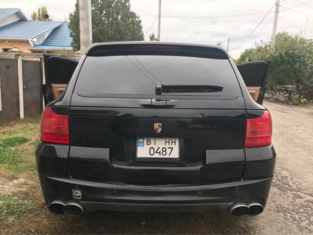 Черный Порше Каен, объемом двигателя 4.5 л и пробегом 212 тыс. км за 6300 $, фото 1 на Automoto.ua