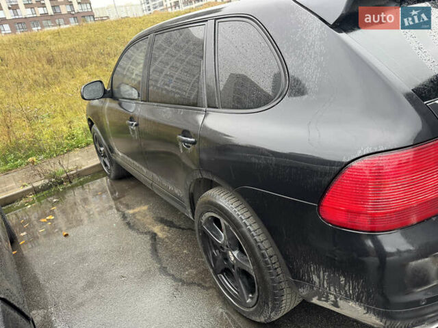 Черный Порше Каен, объемом двигателя 4.5 л и пробегом 111 тыс. км за 8500 $, фото 6 на Automoto.ua