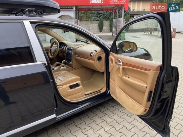 Черный Порше Каен, объемом двигателя 4.51 л и пробегом 180 тыс. км за 12500 $, фото 11 на Automoto.ua