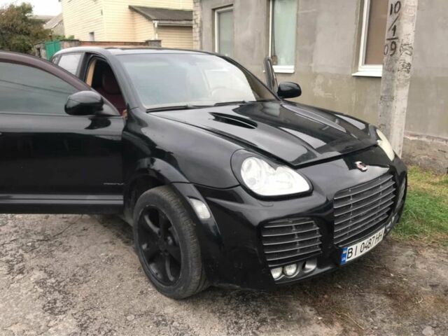 Черный Порше Каен, объемом двигателя 4.5 л и пробегом 212 тыс. км за 6300 $, фото 7 на Automoto.ua