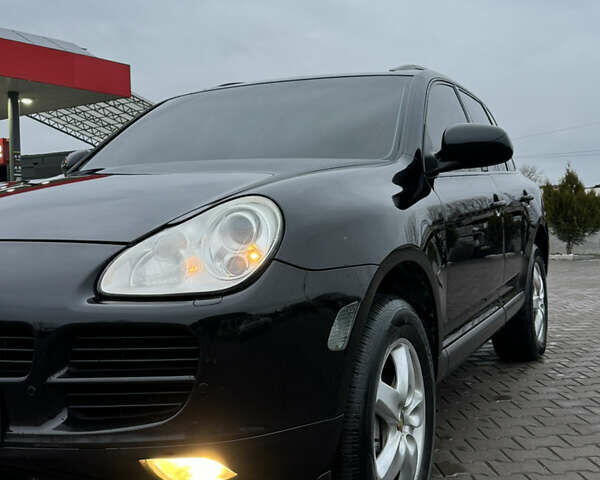 Чорний Порше Cayenne, об'ємом двигуна 4.51 л та пробігом 205 тис. км за 6300 $, фото 1 на Automoto.ua