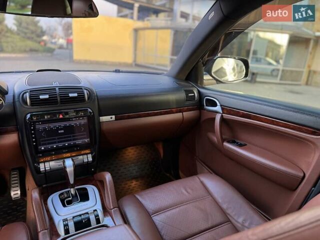 Черный Порше Каен, объемом двигателя 4.8 л и пробегом 247 тыс. км за 8950 $, фото 30 на Automoto.ua