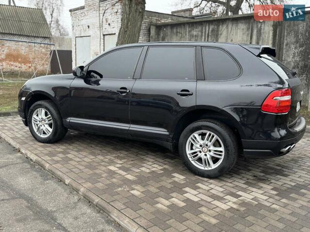 Черный Порше Каен, объемом двигателя 4.81 л и пробегом 195 тыс. км за 6900 $, фото 5 на Automoto.ua