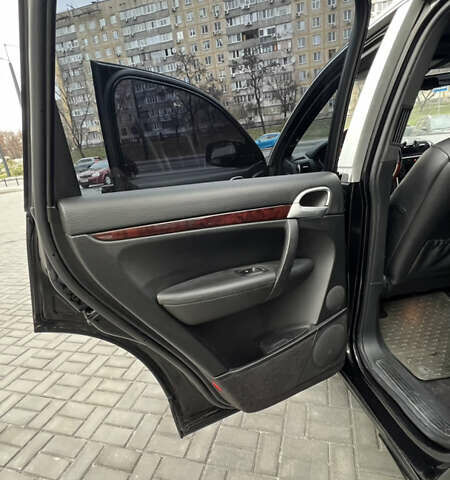 Черный Порше Каен, объемом двигателя 4.8 л и пробегом 190 тыс. км за 9900 $, фото 11 на Automoto.ua