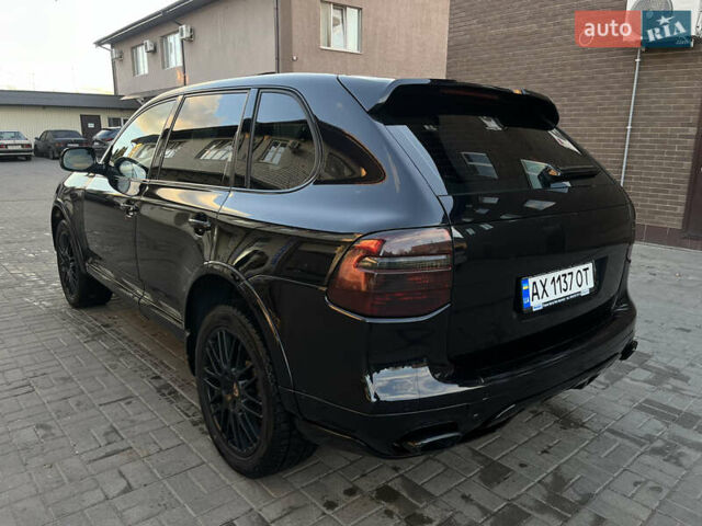 Черный Порше Каен, объемом двигателя 3.6 л и пробегом 232 тыс. км за 12500 $, фото 2 на Automoto.ua