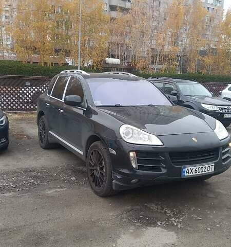 Черный Порше Каен, объемом двигателя 4.8 л и пробегом 170 тыс. км за 10400 $, фото 2 на Automoto.ua