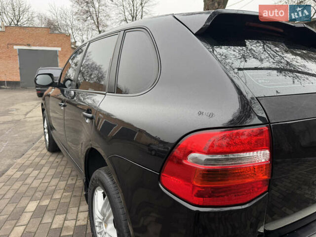 Черный Порше Каен, объемом двигателя 4.81 л и пробегом 195 тыс. км за 6900 $, фото 10 на Automoto.ua