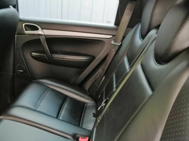 Черный Порше Каен, объемом двигателя 4.8 л и пробегом 164 тыс. км за 6650 $, фото 8 на Automoto.ua