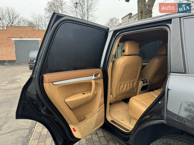 Черный Порше Каен, объемом двигателя 4.81 л и пробегом 195 тыс. км за 6900 $, фото 25 на Automoto.ua