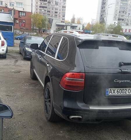 Черный Порше Каен, объемом двигателя 4.8 л и пробегом 170 тыс. км за 10400 $, фото 4 на Automoto.ua