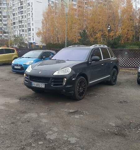 Черный Порше Каен, объемом двигателя 4.8 л и пробегом 170 тыс. км за 10400 $, фото 1 на Automoto.ua