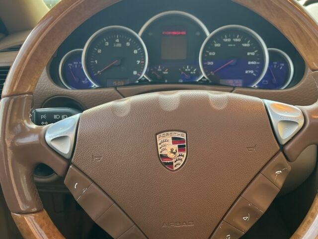 Черный Порше Каен, объемом двигателя 4.8 л и пробегом 136 тыс. км за 9000 $, фото 6 на Automoto.ua