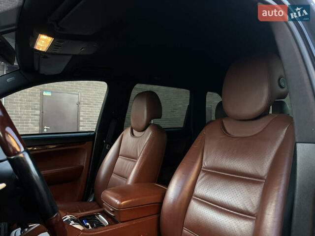 Черный Порше Каен, объемом двигателя 3.6 л и пробегом 232 тыс. км за 12500 $, фото 14 на Automoto.ua