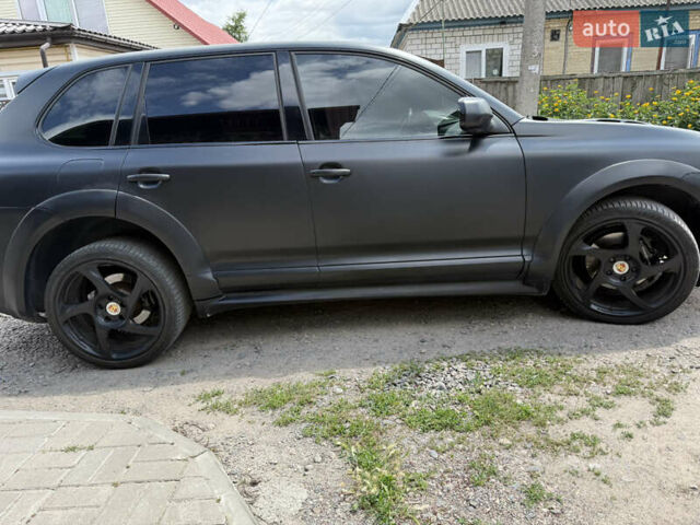 Черный Порше Каен, объемом двигателя 4.81 л и пробегом 178 тыс. км за 9431 $, фото 3 на Automoto.ua