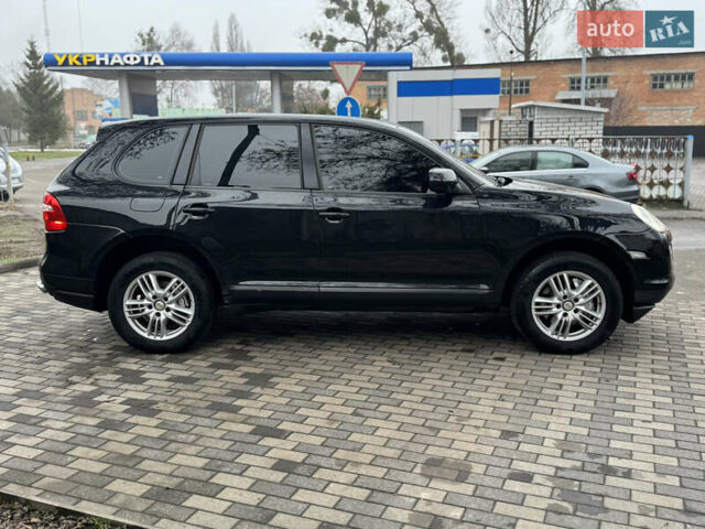 Черный Порше Каен, объемом двигателя 4.81 л и пробегом 195 тыс. км за 6900 $, фото 4 на Automoto.ua