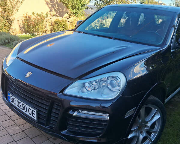 Чорний Порше Cayenne, об'ємом двигуна 4.81 л та пробігом 221 тис. км за 10600 $, фото 1 на Automoto.ua