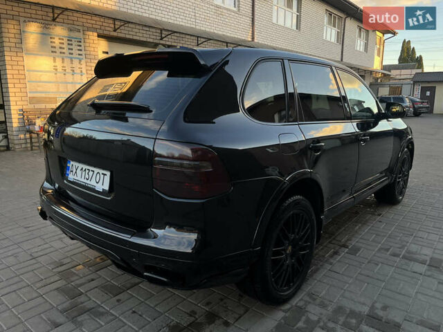 Черный Порше Каен, объемом двигателя 3.6 л и пробегом 232 тыс. км за 12500 $, фото 4 на Automoto.ua