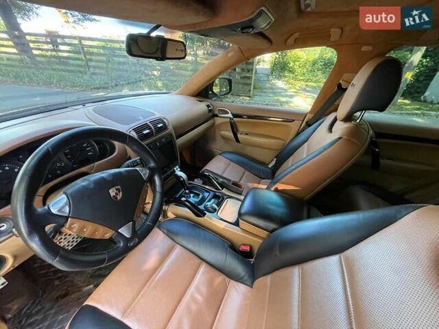 Черный Порше Каен, объемом двигателя 3.6 л и пробегом 247 тыс. км за 15990 $, фото 30 на Automoto.ua