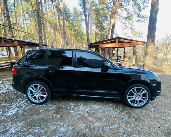 Черный Порше Каен, объемом двигателя 4.81 л и пробегом 90 тыс. км за 11500 $, фото 2 на Automoto.ua